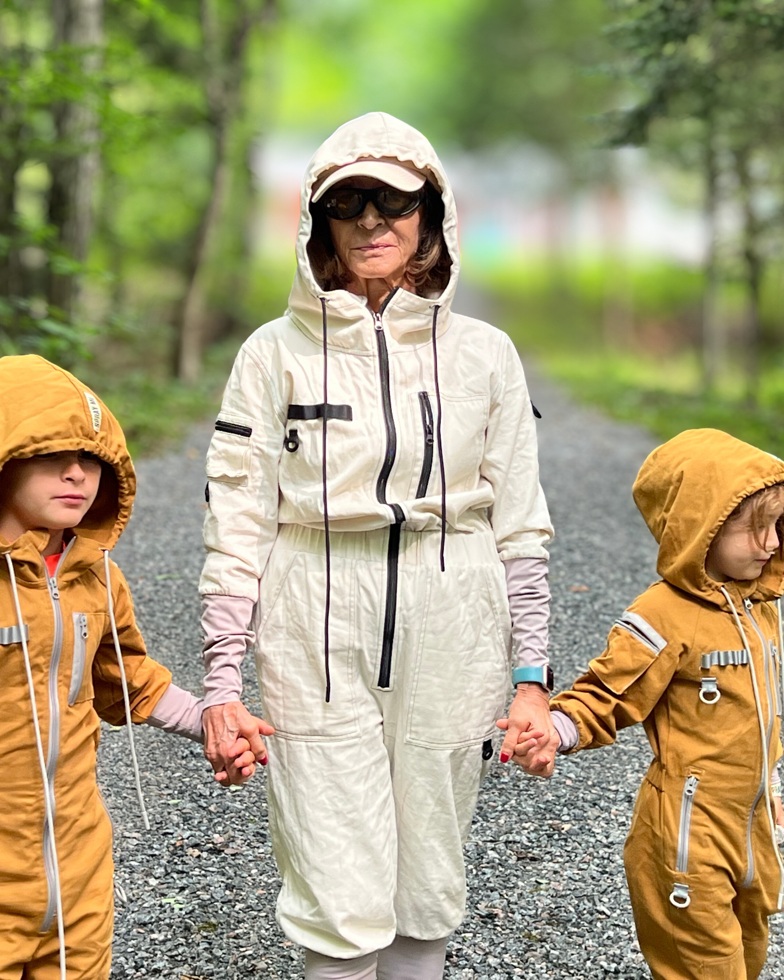 Family wearing TickOffTicks tick suit clothing while enjoying time outdoors

